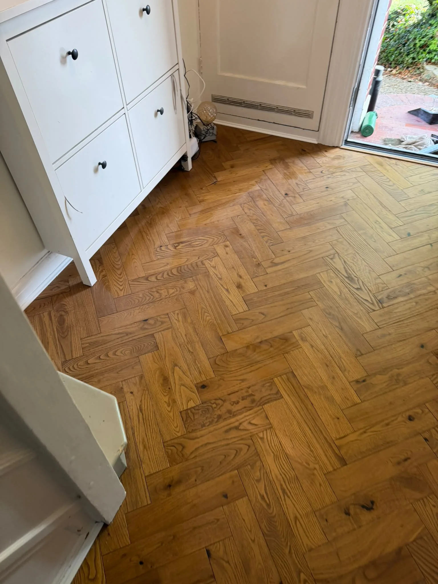 Warm Rustic Reclaimed Herringbone engineered oak flooring fitted in a entrance hall, Guildford