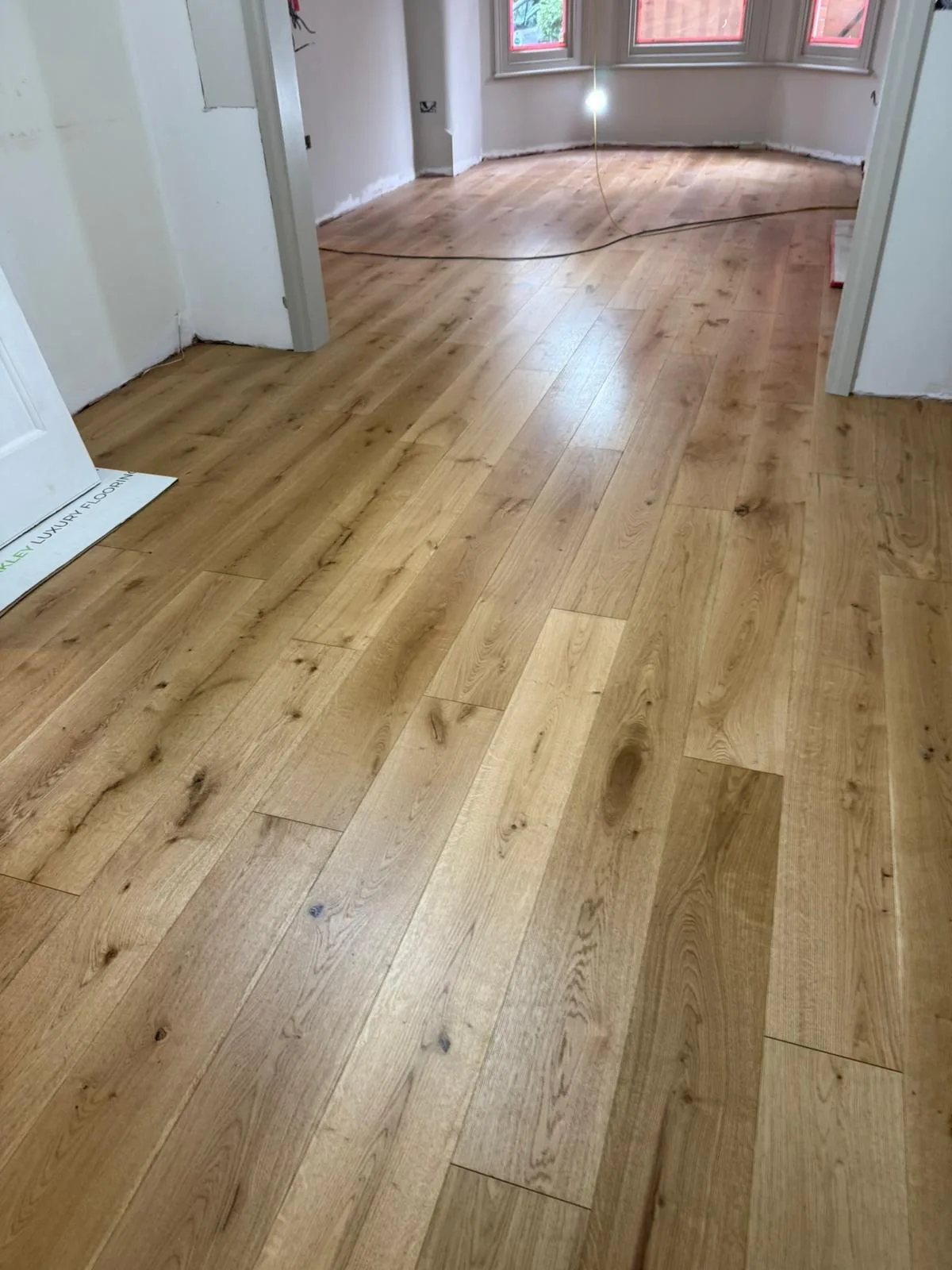 American Oak Natural 190mm engineered oak flooring fitted in a bay-window reception, mid-installation, Wanstead