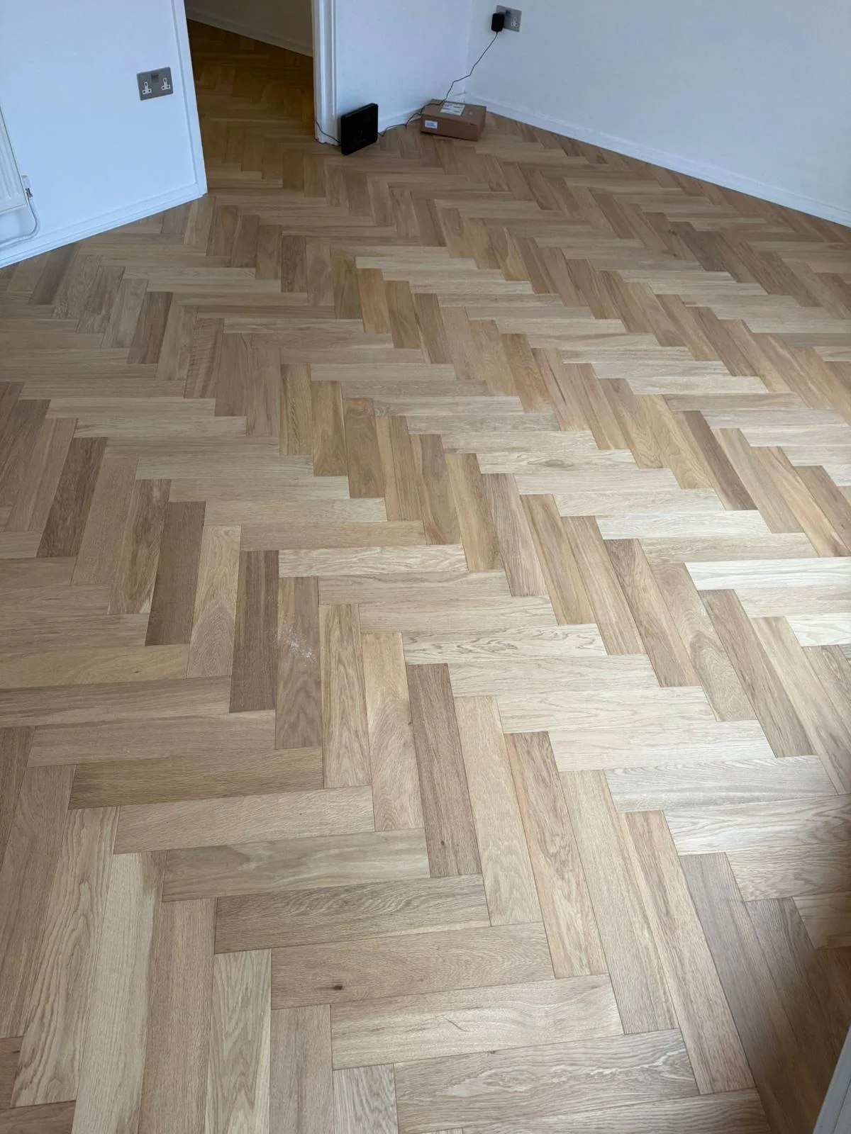Invisible-Oil Oak Parquet 90×450 engineered oak flooring fitted in a living room, Fulham