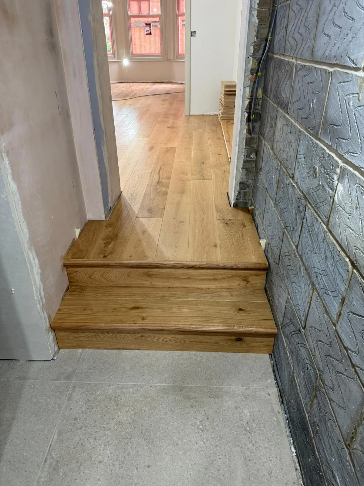 Natural Oak Brushed & Oiled 190mm engineered oak flooring fitted in a split-level with matching oak steps, Chiswick