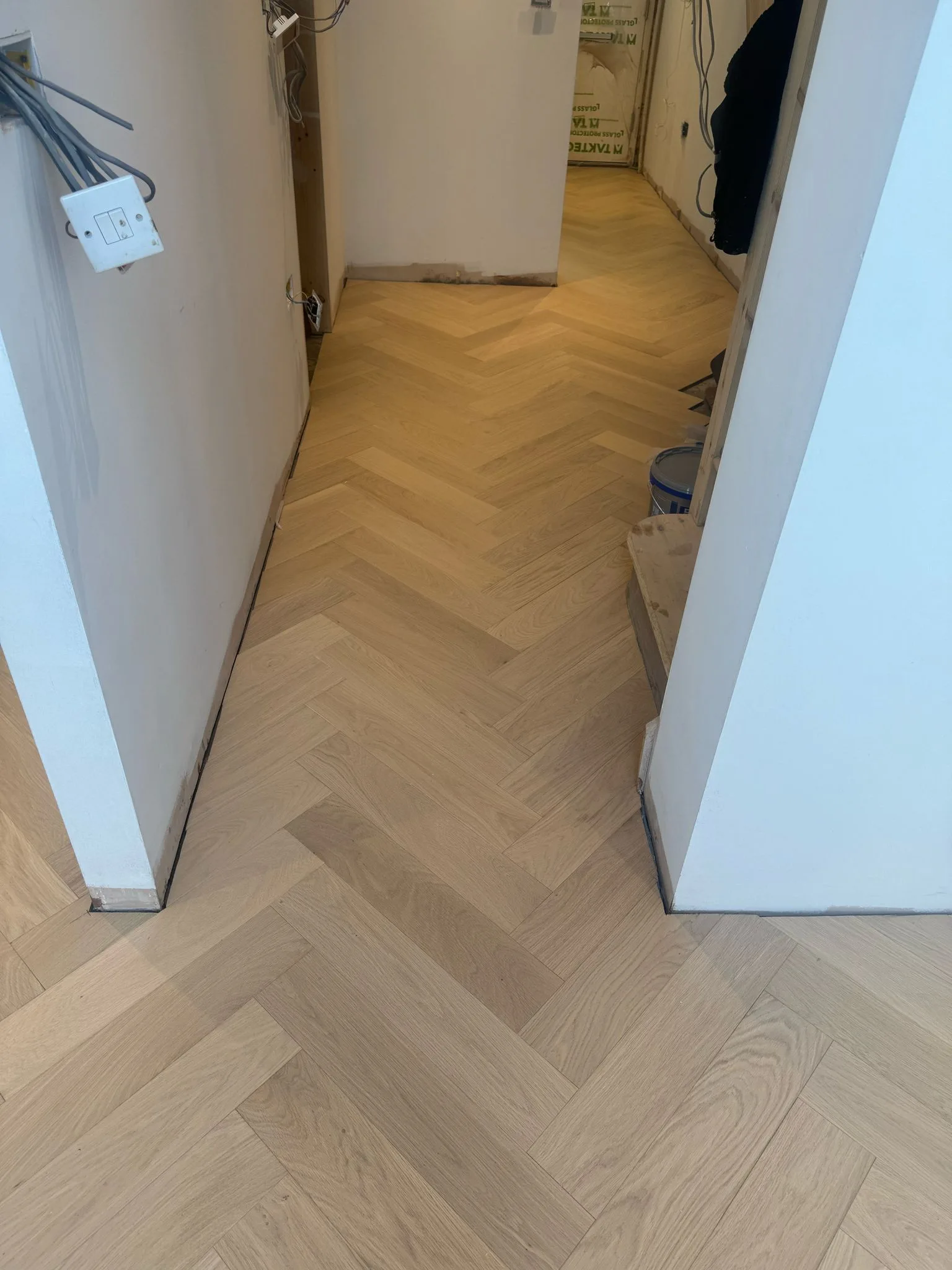 White-Oiled Oak Herringbone 90×450 engineered oak flooring fitted in a ground-floor landing, Rickmansworth