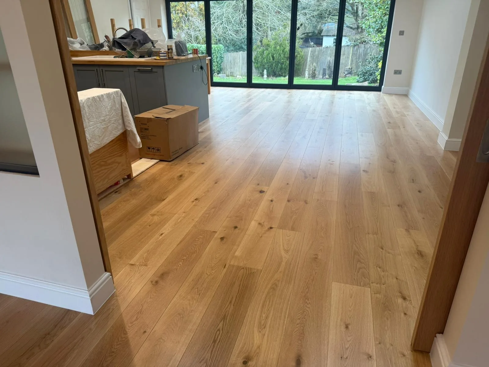 Natural Oak Brushed & Oiled 190mm engineered oak flooring fitted in a kitchen and garden room, Berkhamsted
